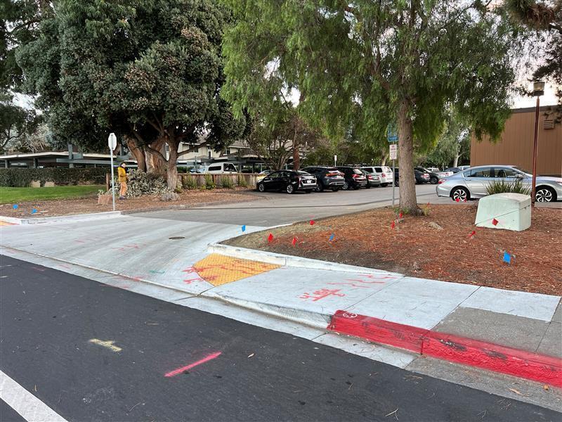The parking lot entrance behind The Vibe near the boathouse. 